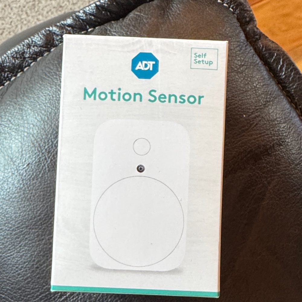 ADT White Motion Sensor with Teal Accents